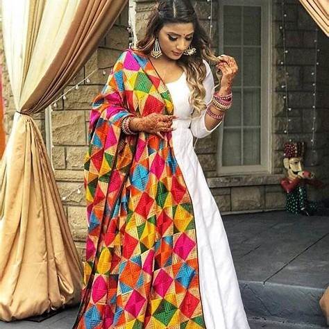Elegant handcrated Phulkari  with vibrant embroidery ￼